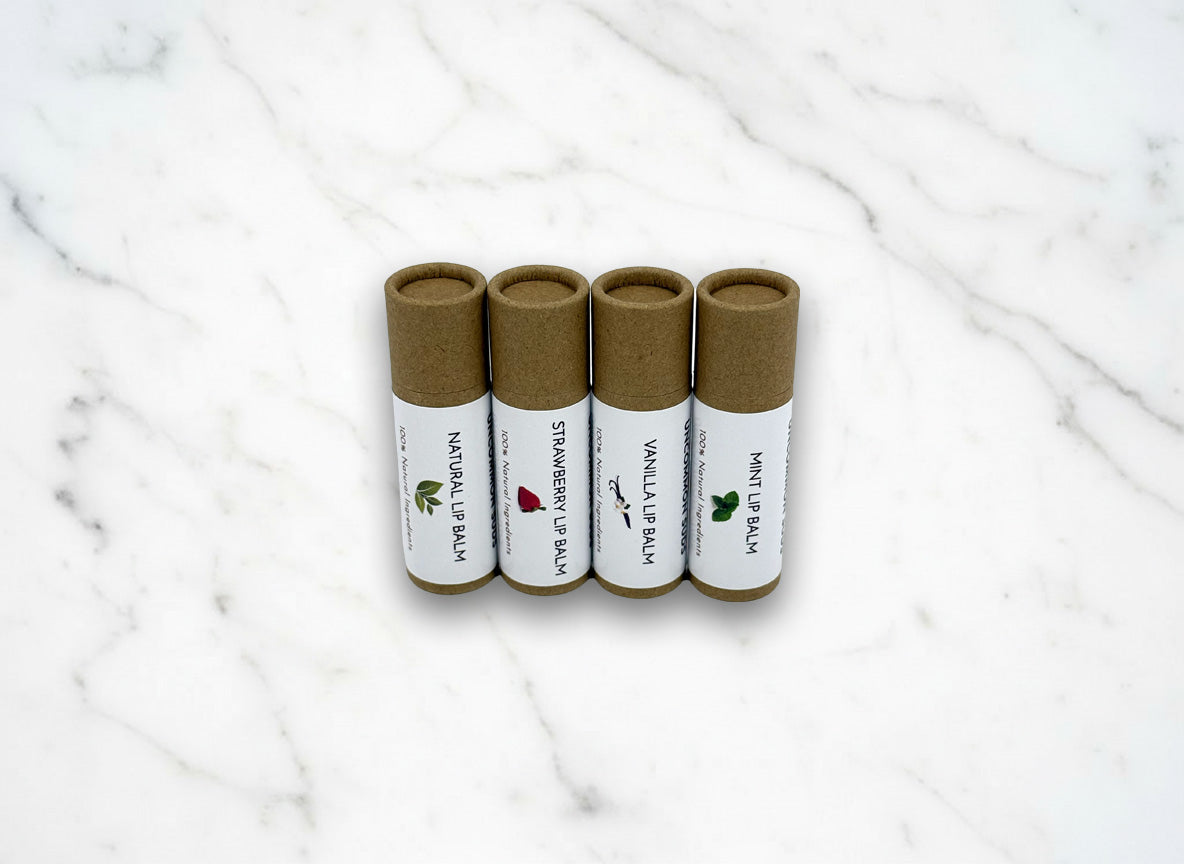 Uncommon Suds -  Lip Balm 4 Pack Front View - Natural - Vanilla - Strawberry and Mint Flavors