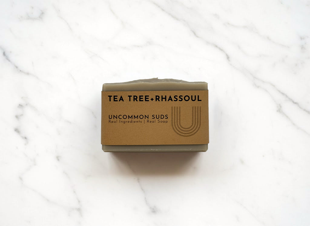 Front of Tea Tree and Rhassoul Soap Bar with Uncommon Suds Label